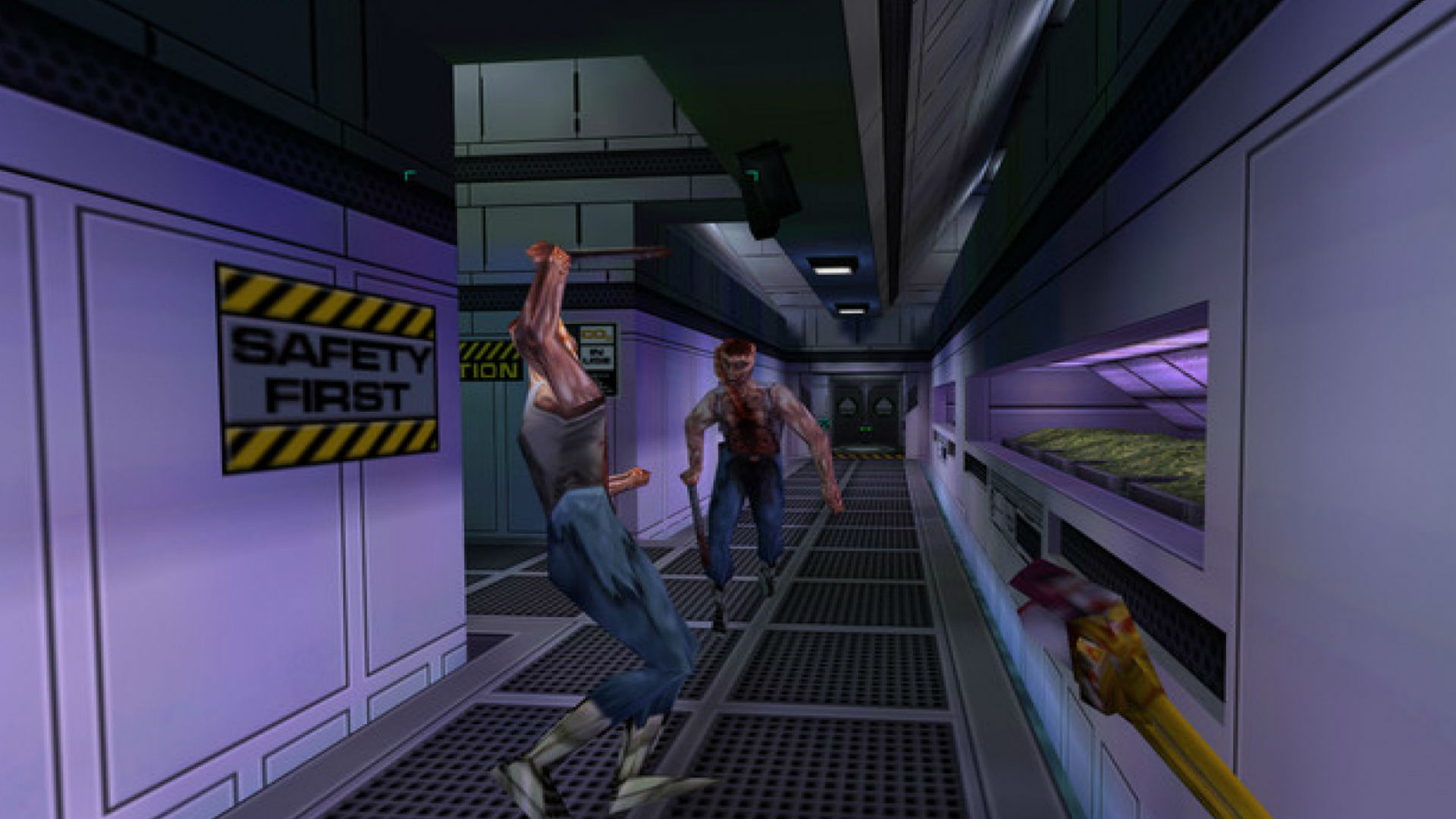 An altercation in a corridor in System Shock 2, one of the best old games. The sign on the wall reads 'Safety First'.