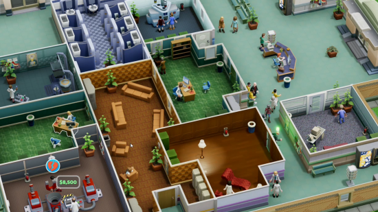 Best management games: a well run hospital in Two Point Hospital, complete with staff rooms, treatment areas, and GP offices.