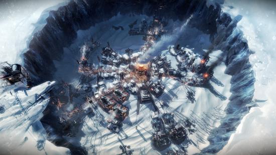 Best management games: a frozen factory city from Frostpunk that's inside a crater.