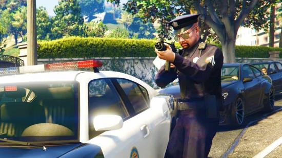 GTA 6 leaker arrested: A police officer readies a shotgun while standing beside a patrol car