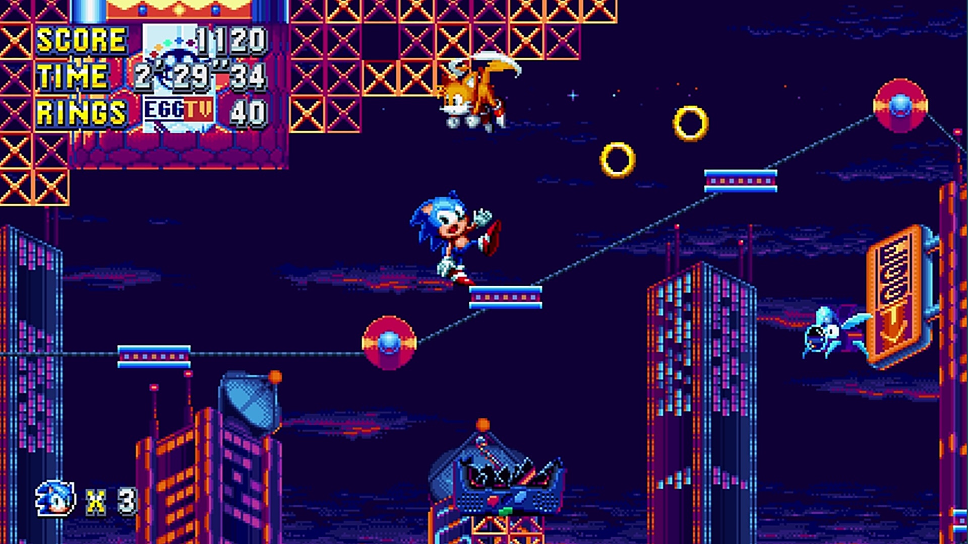 Best retro games: Sonic Mania. Image shows Sonic wobbly precariously on a platform while Tails flies past.