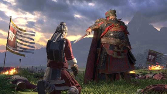 Total War: Three Kingdoms on Game Pass: Dong Zhuo holds a sword to a prisoner's throat