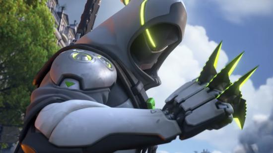 Overwatch 2 talents: Genji holds some blades between his fingers