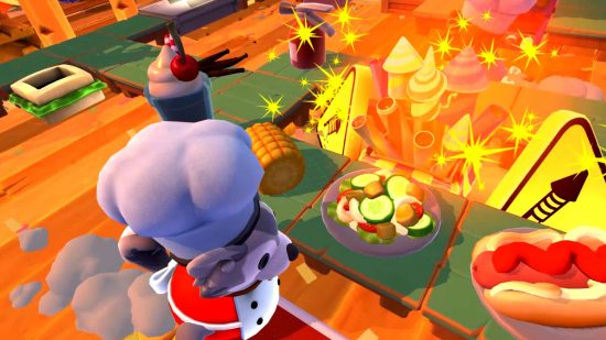 Games zoals Fall Guys: een schattige wasbeerchef kookt een kleurrijke maaltijd in Overcooked 2