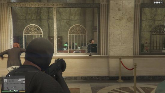 Best GTA 5 mods - a gunman is aiming at a bank teller at her desk.