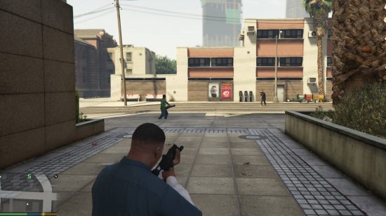 Best GTA 5 mods - Franklin is aiming his gun at two citizens who are firing shots at each other.