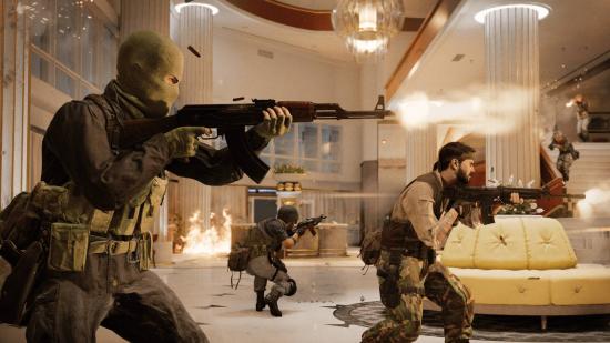 A squad in a bright hotel foyer shooting guns at another team in the Call of Duty Cold War beta