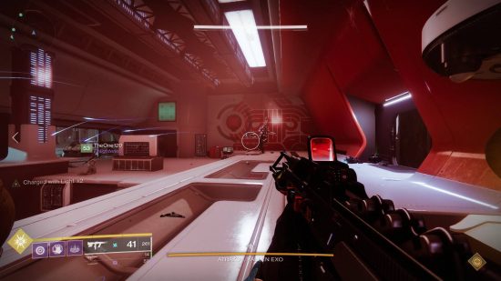 Destiny 2 Beyond Light raid: first person view of a futuristic white room covered in clean red patterns.