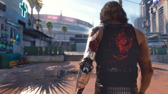 Cyberpunk 2077 endings: Johnny Silverhand is walking towards a stadium. His left arm is amputated with a cybernetic arm in its place.