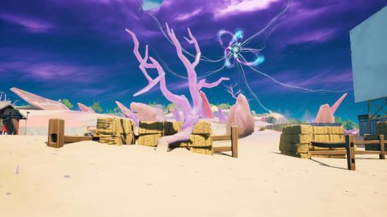 A crystal tree near the Zero Point in Fortnite. It's by some hay.