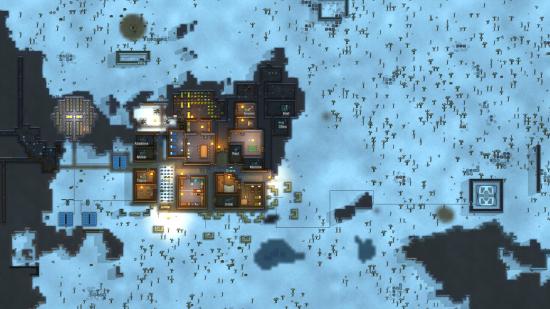 Best management games: an overhead view of a town in the snow in Rimworld.
