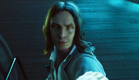 A vampire from Vampire: The Masquerade – Bloodlines 2 staring at the screen