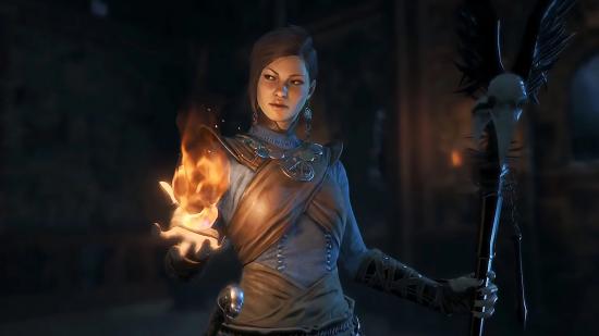 A Sorceress wielding a staff in her right hand and a flame in her left hand