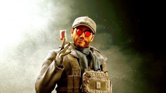 Flores holding up a card for his Rainbow Six Siege portrait