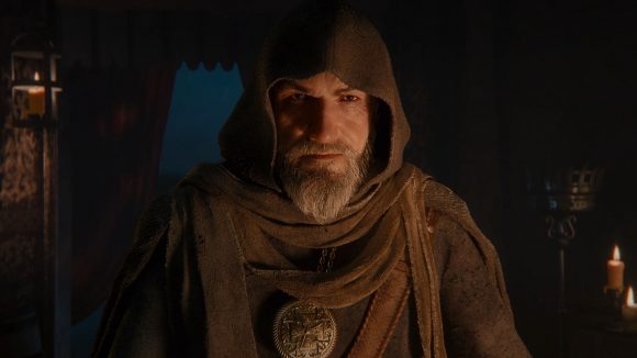 The adviser from Total War: Warhammer, an old man in a brown hooded cloak, wearing several leather wraps and a golden medallion