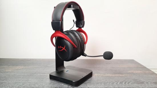 HyperX's Cloud 2 Wireless headset is suspended above the table by a headset stand