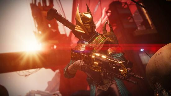 One of Destiny 2's Warlocks holding a Trials of Osiris gun while the sun shines behind them