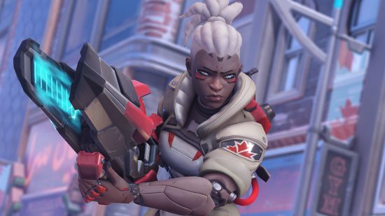 Overwatch 2 Sojourn abilities: Sojourn, a cybernetically augmented mid-range DPS hero in Blizzard's FPS game, charging through a winter map while wielding her trusty Railgun