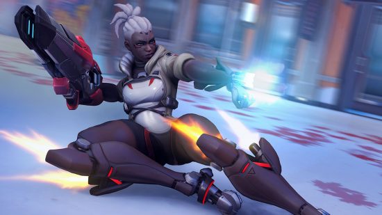 Overwatch 2 Sojourn abilities: Sojourn in the midst of performing her Power Slide, a high mobility skill that can be used offensively or defensively during combat.