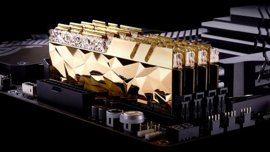 Four gold G.Skill Trident Z RGB Royal Elite DDR4 RAM modules sit in a motherboard