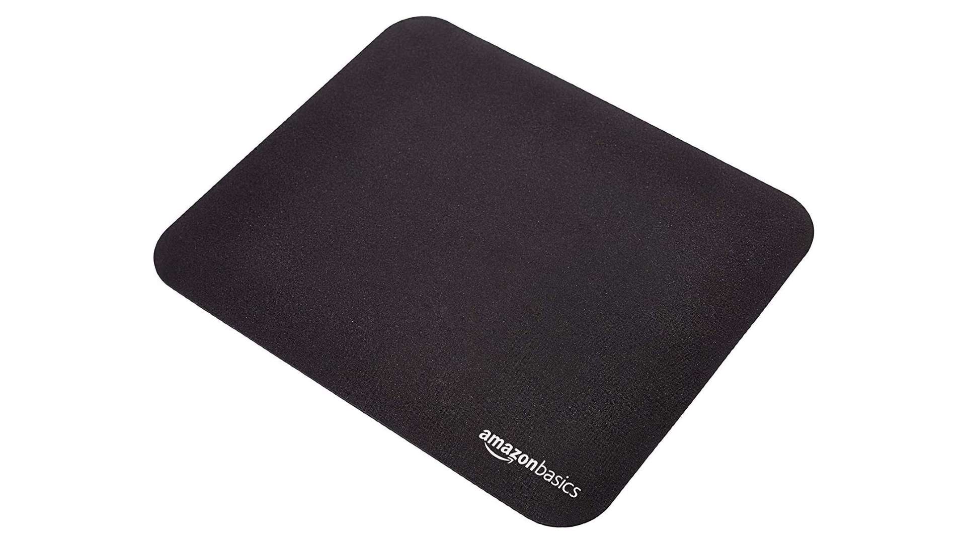 A small black mouse pad with a white Amazon logo in the lower right corner.