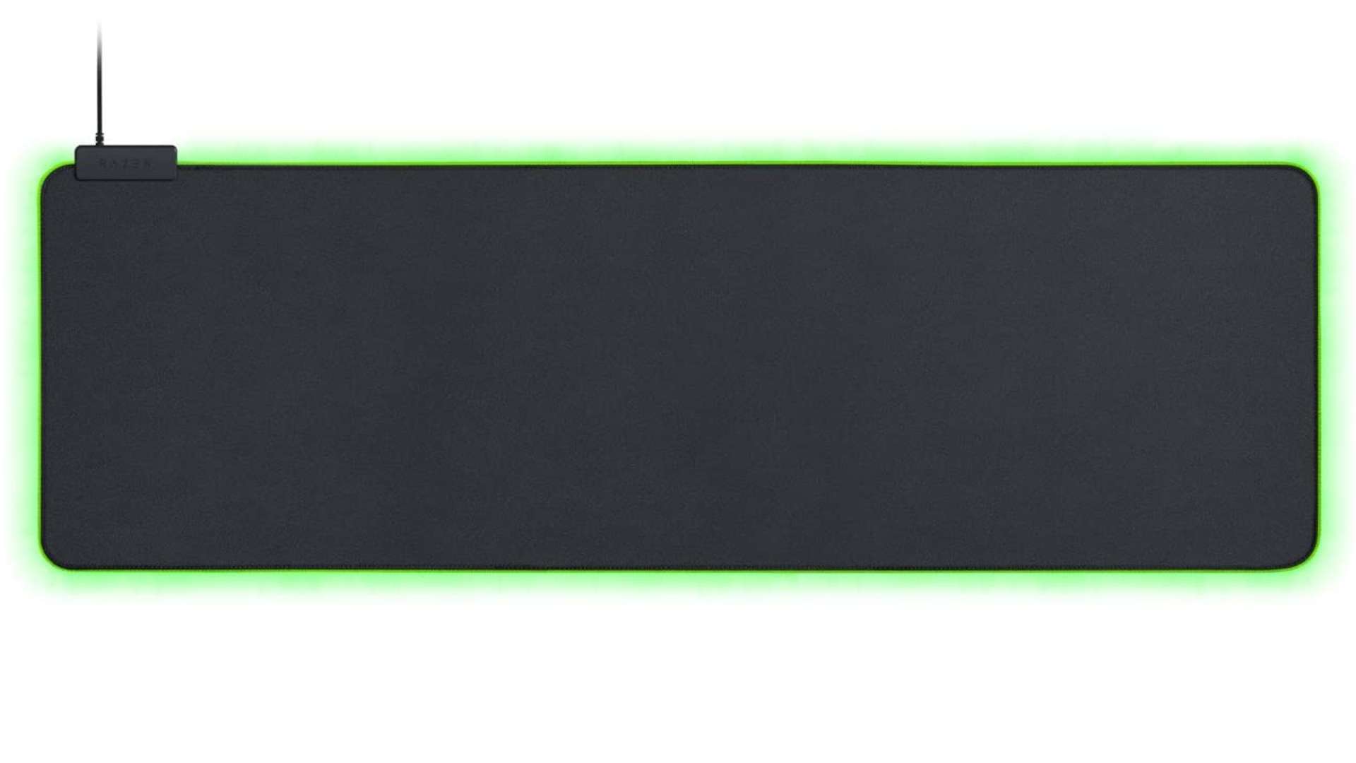 Una alfombrilla de ratón Razer Goliathus Extended Chroma tiene bordes iluminados RGB verdes sobre un fondo blanco