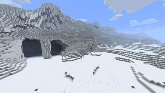 Najlepsze mapy Minecraft - jaskinia zakopana na górze na pokrytej śniegu mapą arktyczną