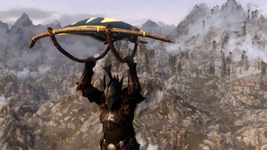 A Breath of the Wild-inspired paraglider mod being used in Skyrim by an armoured Dragonborn