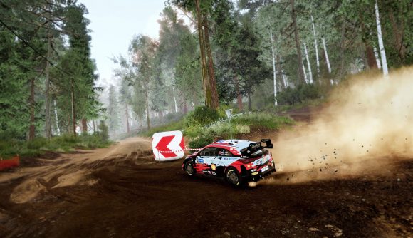 Turning a corner on a dirt track in WRC 10