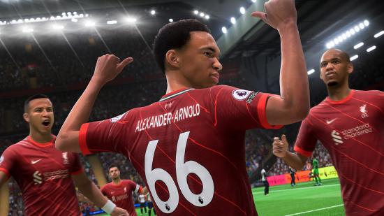 Trent Alexander-Arnold pointing to his name in FIFA 22 as he celebrates scoring a goal