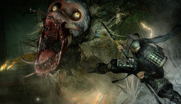Kicking a very ugly monster in the face in Nioh