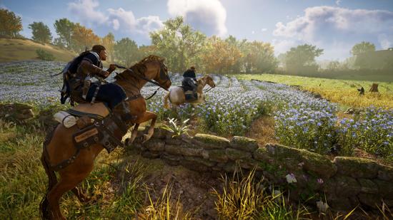 Eivor and a companion ride on horseback through a sunny field of flowers in Assassin's Creed Valhalla.