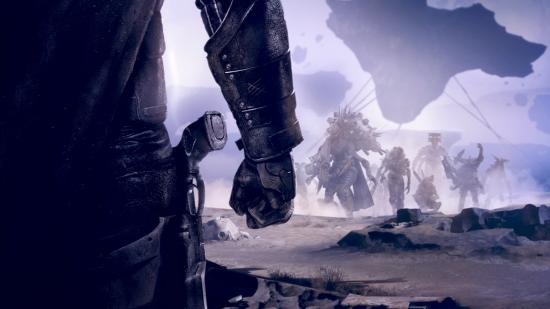 A closeup of a fist and a holstered gun as enemies approach in Destiny 2