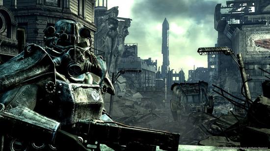 A figure in power armour looms in the foreground in front of the ruins of Washington, DC in Fallout 3.