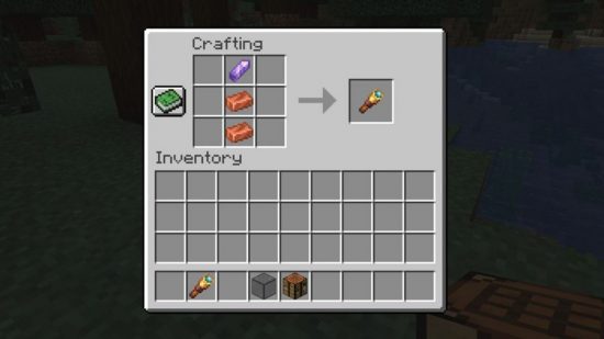 Minecraft amethyst: How to make a spyglass - The Minecraft spyglass recipe on a crafting bench, with two copper ingots and an amethyst shard.