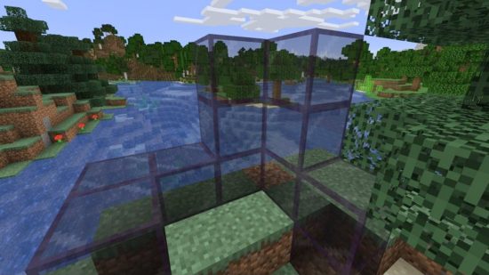 Minecraft amethyst - how to make tinted glass: The new tinted glass block in Minecraft, overlooking water, showing the difference looking through the glass and without it.