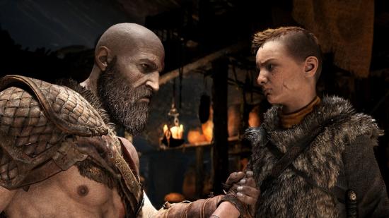 God of War screenshot with Kratos grabbing Atreus