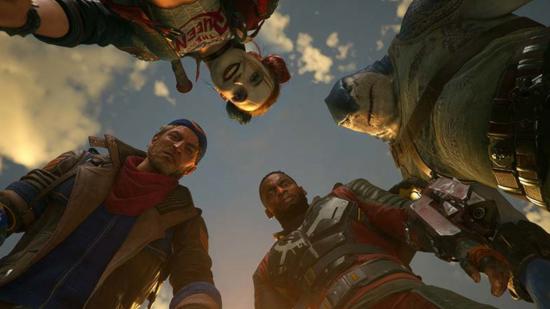 The Suicide Squad - Deadshot, Harley Quinn, King Shark, and Captain Boomerang - surround the camera