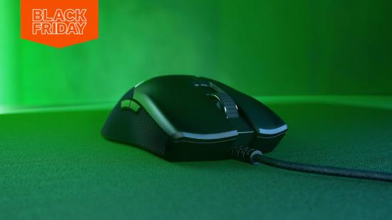 A Razer gaming mouse sits in green smoke for Black Friday