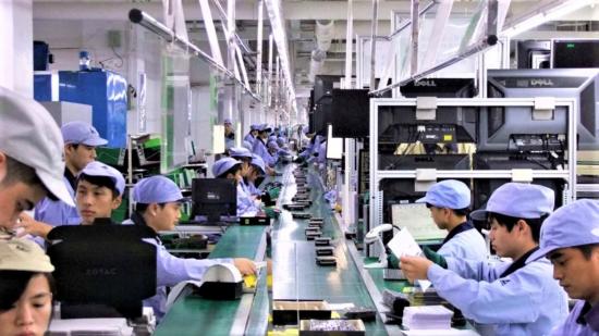 Photo of GPU factory with workers in protective clothing