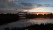 A Russian river at sunset in Euro Truck Simulator 2