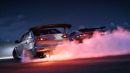 A screenshot from Forza Horizon 5, featuring two cars racing in the darkness and creating volumetric smoke