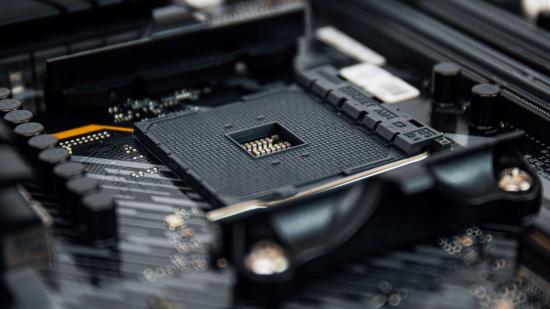 A close up of a motherboard's CPU socket
