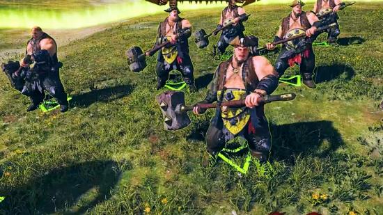 Ogre maneaters line up with their anti-large hammers in Total War: Warhammer 3.