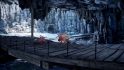 Two monsters crossing a bridge in a frozen cave in the Molten Depths expedition of Outriders New Horizon.