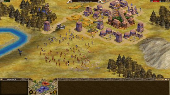 Los mejores juegos como Age of Empires: una civilización que crece cerca de un río y algunos árboles en Rise of Nations