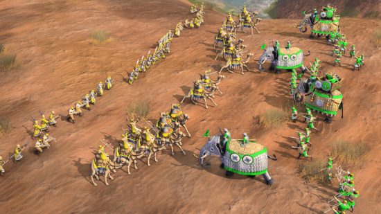Permainan Strategi Terbaik - Gajah dengan jubah hijau mengenakan tentera kuning pada kuda di padang pasir di Age of Empires 4