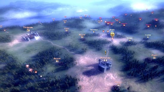 Games like Total War: The campaign map in Real Warfare 2: Northern Crusades, showing a group of settlements situated between dense forests.