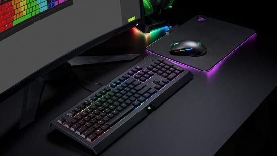 A RGB gaming setup, featuring a keyboard, mouse and mouse pad with RGB lighting.