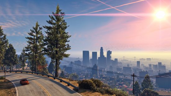 Best crime games on PC: a car drives along a mountain side road overlooking a huge city